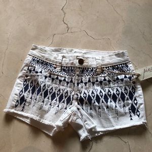 White shorts with blue detailing